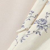 Xolani l Florales Midikleid mit Schnürkorsett und Puffärmeln