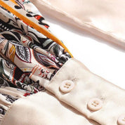 Seda | Satinbluse mit Spitzendetails und Blumenmuster