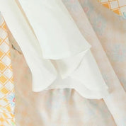 Xolani l Florales Midikleid mit Schnürkorsett und Puffärmeln