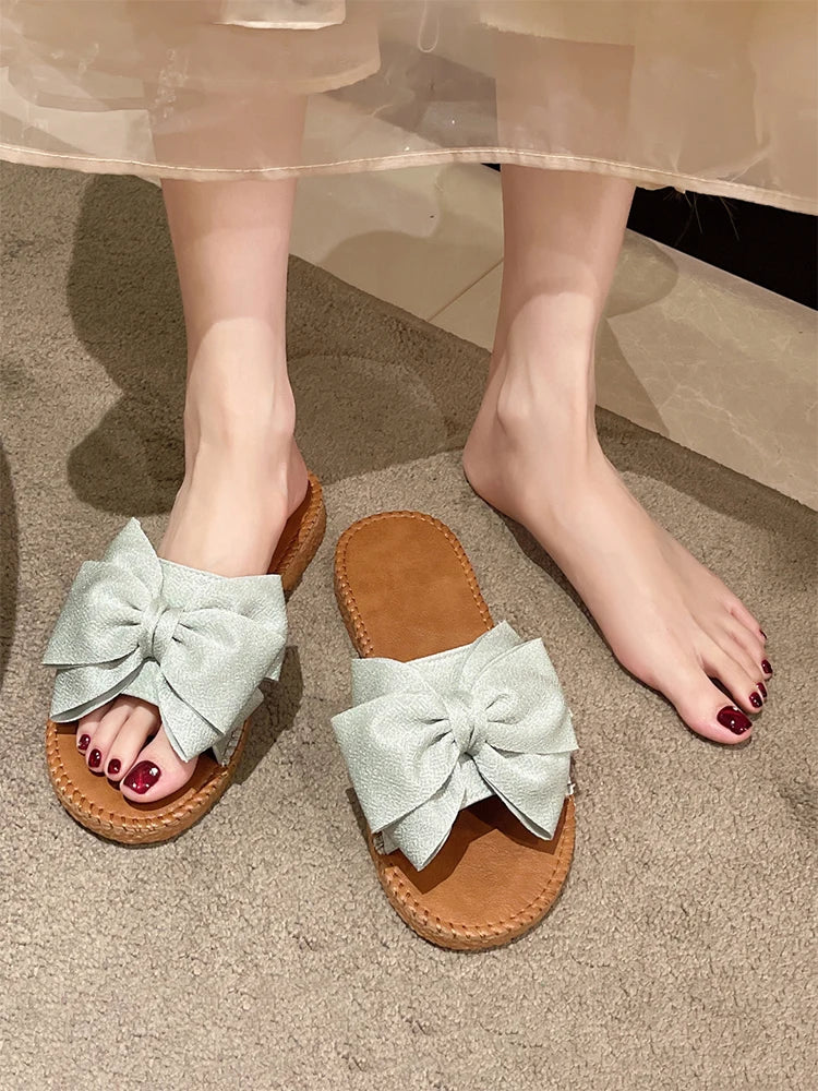 Kehlani l Sommerflache Strandsandalen mit Schleife und Knoten