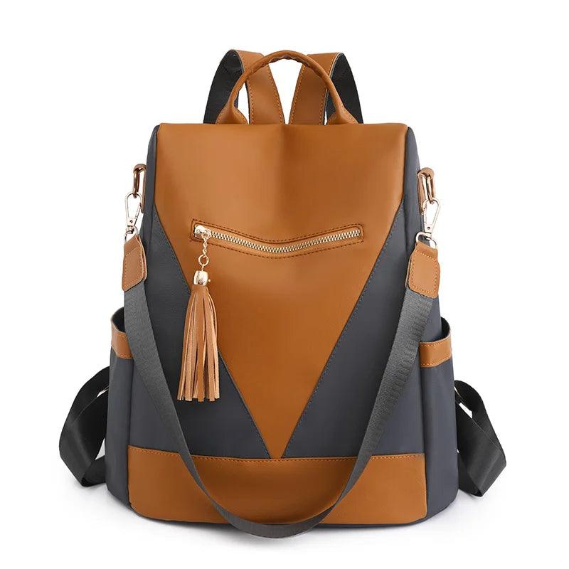 Zahra l Rucksack in Zwei-Farben-Optik mit Quastenanhänger