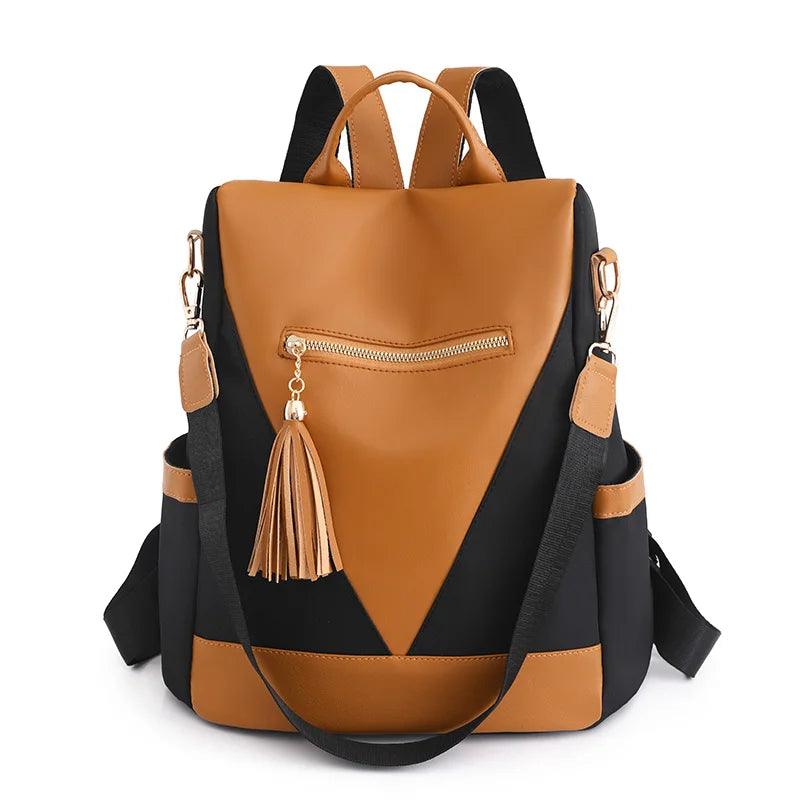 Zahra l Rucksack in Zwei-Farben-Optik mit Quastenanhänger